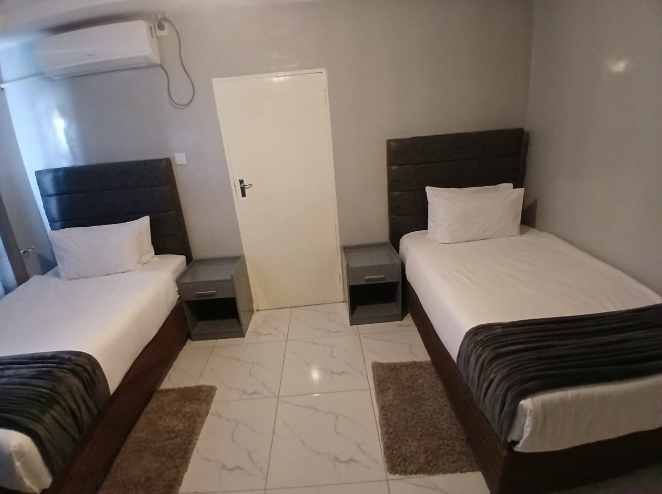 Twin Room - Comfortable Bedding and Setup